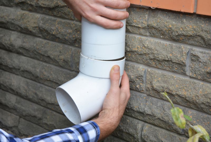 Downspout Reattachment in Boulder, CO